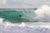 surfing in barrel wave