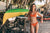 girl in swimsuit in front of kayak