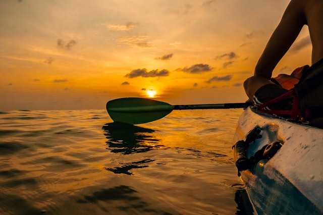kayaking on sunset