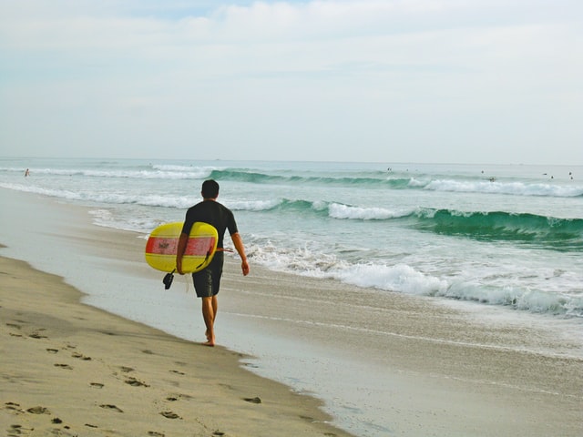 surfboard and men
