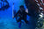 men scuba diving
