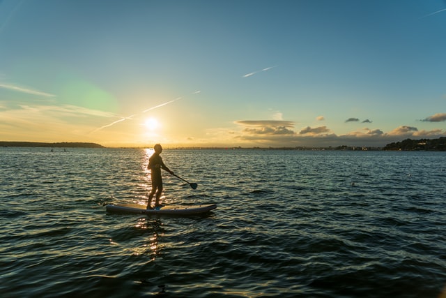 paddleboarding-on-sunset