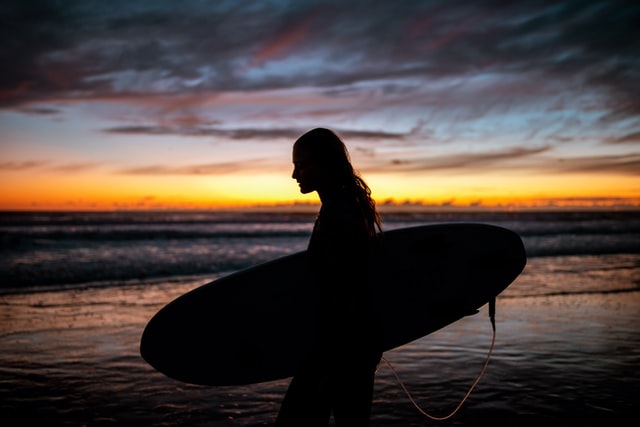 girl with surfboard