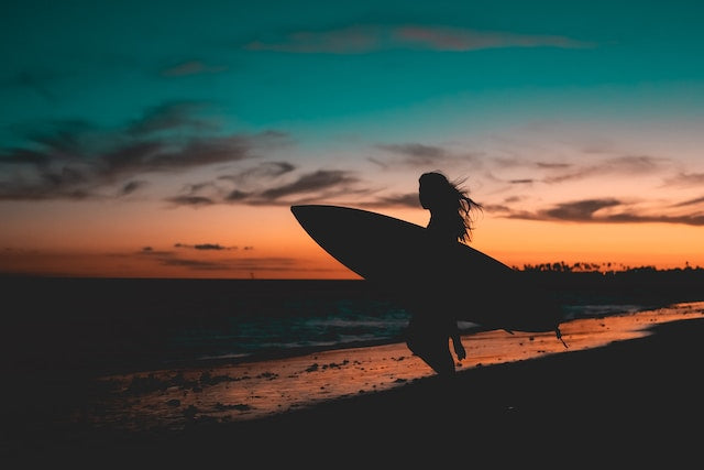sunset surfing