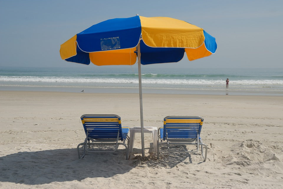 beach umbrella and beach chairs
