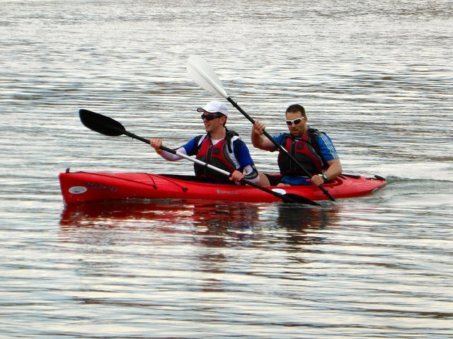 two persons on kayak
