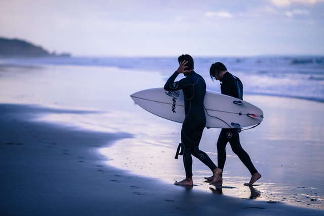 two guys in wet suit