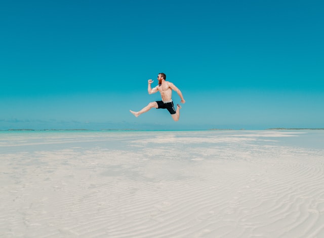 man with board shorts