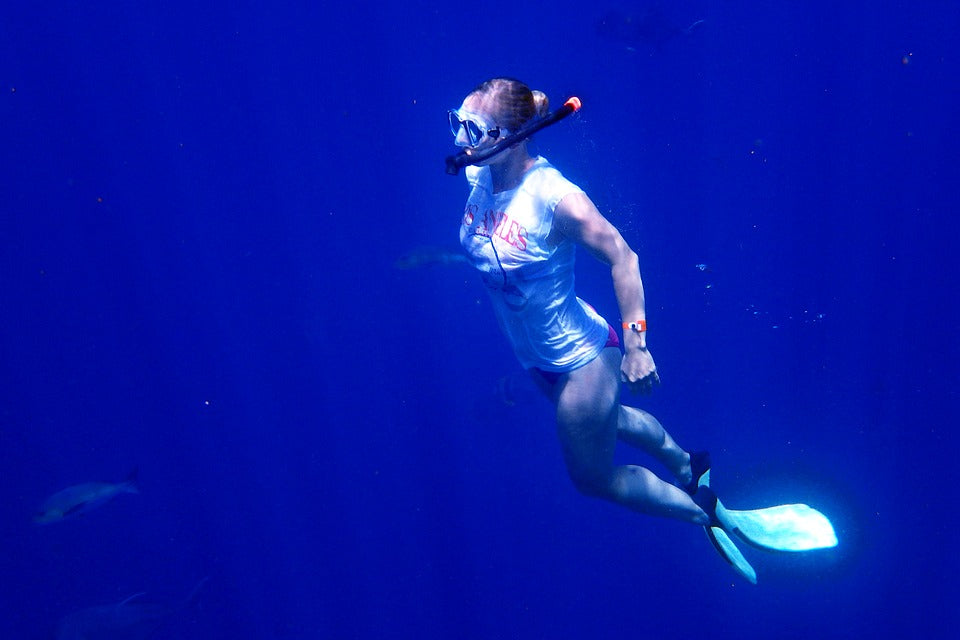 woman exploring underwater